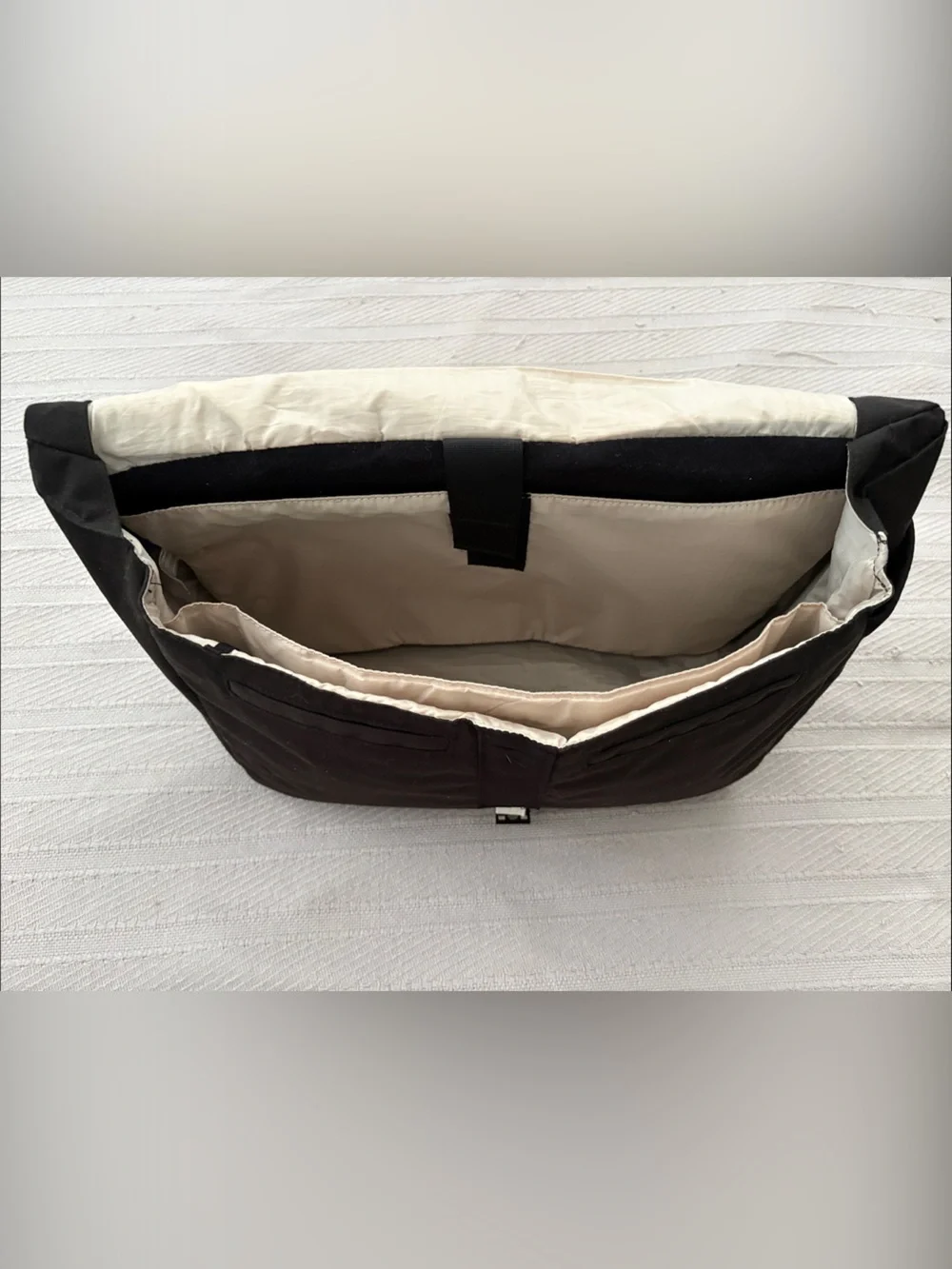 cotopaxi Black Messenger Bag with Cream Stripe